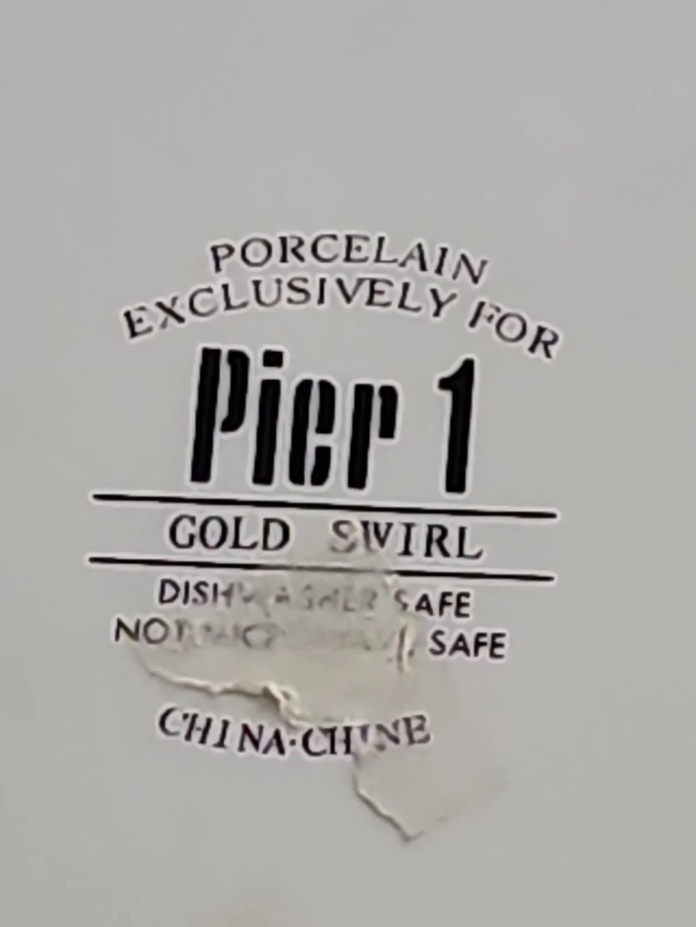 Pier 1 White Dinner Plate with Gold Swirl Scroll Border